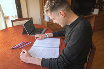 boy studying at home