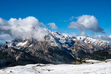 First snow in the Italian dolomites during autumn. World heritage in South Tyrol in Italy.