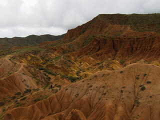 Skazka canyon on the shore of the Issyk Kul mountain lake. Tosor, Kyrgyzstan