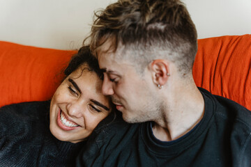 couple watching a film on the sofa