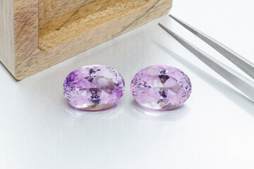 macro mineral faceted stone cut Amethysts on a gray background