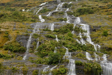 Waterfall next to the road from Te Anau to Milford Sound