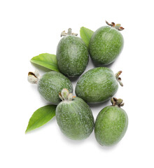 Pile of feijoas and leaves on white background, top view