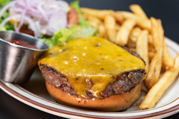 Fresh off the grill cheeseburger served with all the familiar french fries and veggie sides.