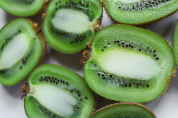 Top view of Kiwi half placed on a white board