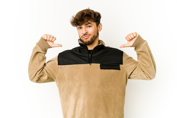 Young arab man on white background feels proud and self confident, example to follow.