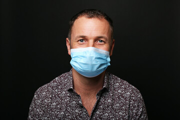 Beautiful man wearing a mouth mask