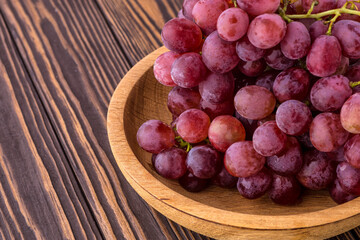 Fresh grapes on the tree. Autumn fruits