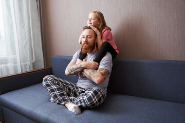 Daughter embrace bearded father