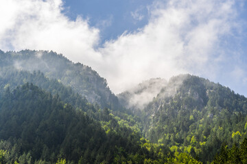 Clouds over Olympus mountain on a sunny day in Norther Greece 