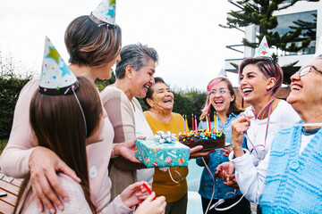 Multi Generation hispanic women Family Celebrating a happy Birthday in Latin America