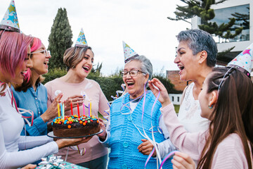 hispanic women Family Celebrating a grandmother happy Birthday in Mexico city