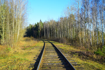 Fototapeta premium The old railway that goes around the bend.