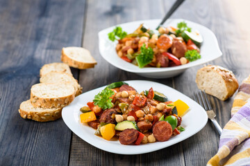 Spanish pot - pot meal with vegetables and sausage