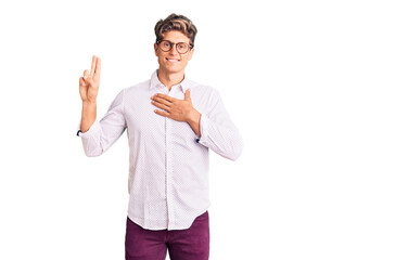 Young handsome man wearing business clothes and glasses smiling swearing with hand on chest and...