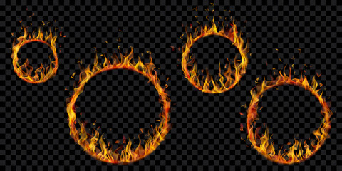 Set of burning hoops in different sizes with translucent fire flames on transparent background. For used on dark illustrations. Transparency only in vector format © Olga Moonlight