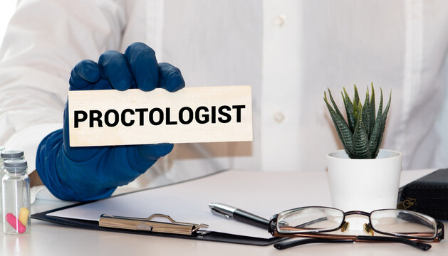 Closeup view of proctologist ready for fingers examination isolated on white background