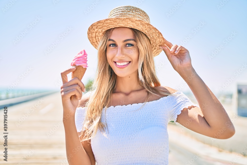 Poster young blonde tourist girl smiling happy eating ice cream at the promenade.