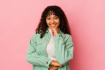 Young african american afro woman isolated smiling happy and confident, touching chin with hand.