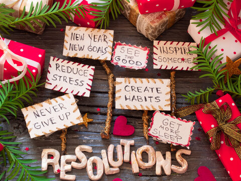 New Year's Resolutions, paper notes on the wooden table