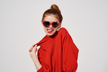 fashion woman in red sweater gesturing with her hands thumb model