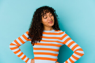 Young african american afro woman isolated dreaming of achieving goals and purposes