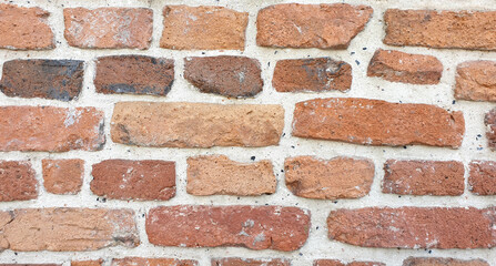 Obraz premium Old red brick wall in medieval monastery. Horizontal background.
