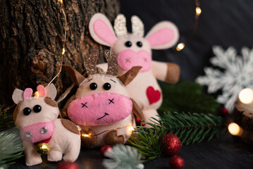 Christmas toys on the handmade Christmas tree. themed decor for a cozy home. new year concept. handmade bull
