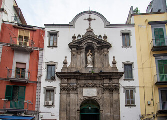 Fototapeta na wymiar Facade of Santa Maria delle Vergini inside the Sanita' district in Naples