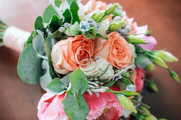Festive bouquet with flowers decorated with leaves