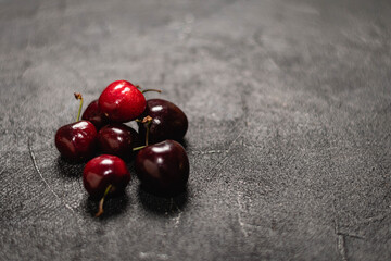 cherries on a wooden background