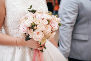 Festive bouquet with flowers decorated with leaves