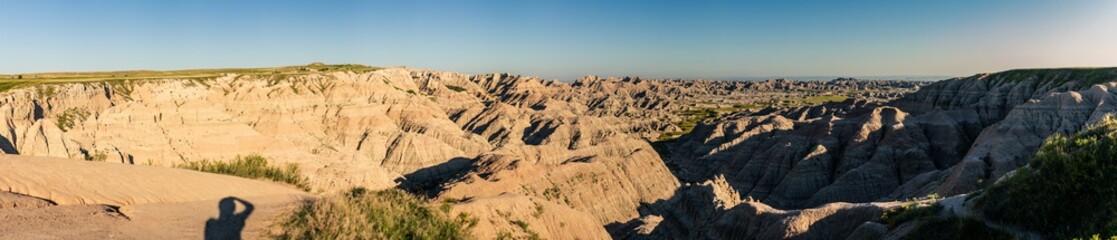 Panorama shot of wrinkled landscape in Badlands national park before sunset in america