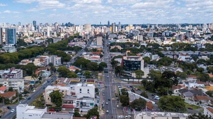 Fototapeta na wymiar Panoramic drone view of the Alto de XV neighborhood, and in the background the center of Curitiba, capital of the state of Paraná, located in southern Brazil