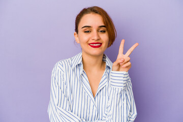 Young arab mixed race woman showing number two with fingers.