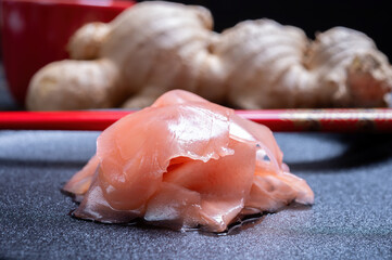 Asian food, pink sliced pickled ginger roots ready to eat