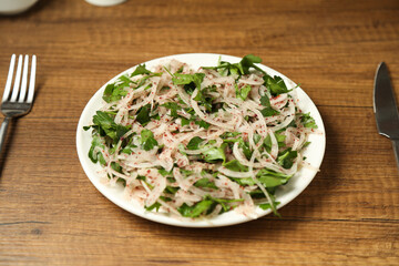 Onion salad on a wooden table