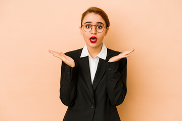 Young skinny caucasian business woman isolated surprised and shocked.