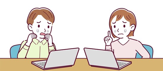 Men and women working on personal computers