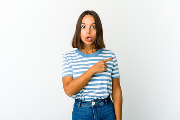 Young mixed race woman pointing to the side