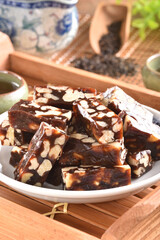 Walnut with Date Cake  on the white plate
