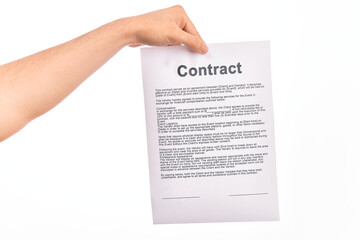 Holding business contract paper over isolated white background