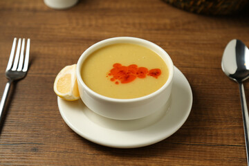 Lentil soup with a slice of lemon