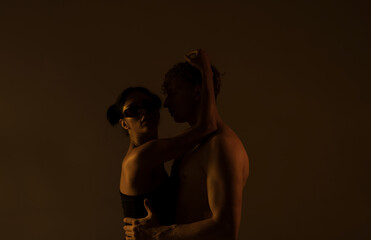 Close-up of young romantic couple. Couple in love. Sensual. Man and woman. Studio. Photo. Lovers....