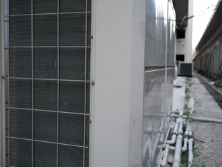 air conditioner compressor outside building.
