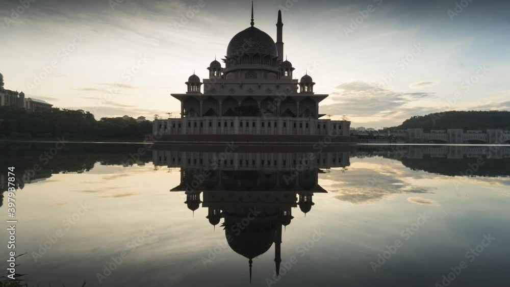 Wall mural timelapse at masjid putra with red cloud change to blue. colourful change cloud during sunrise at ma