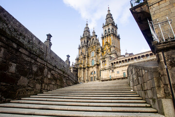 Fototapeta na wymiar stone staircase with the facade of the cathedral of Santiago de Compostela