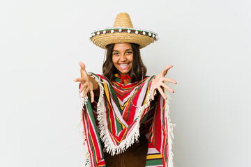 Young mexican woman isolated on white background