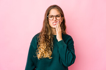 Young caucasian woman having a strong teeth pain, molar ache.