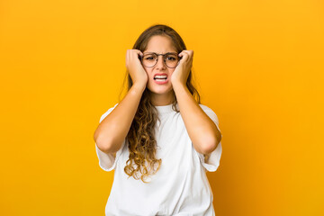 Young caucasian woman crying, unhappy with something, agony and confusion concept.